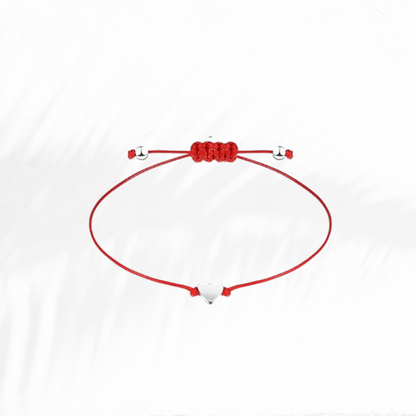 Self-love bracelet for sisterhood. Red thread bracelet with silver heart charm symbolizing love and protection.